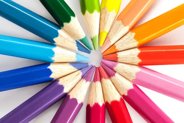 Color pencils in arrange in color wheel colors on white background — Stock Photo, Image