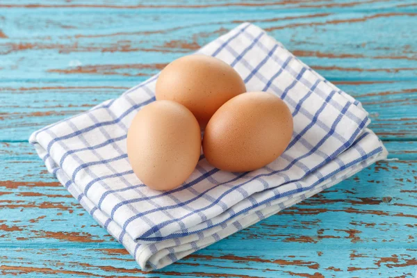 Koken eieren napery keuken hout teak vintage stilleven achtergrond — Stockfoto