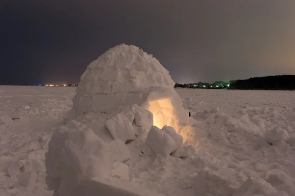 Snow igloo on the frozen sea at night — Stock Photo, Image