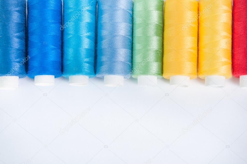Colored threads on a white background