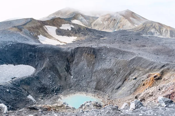 Lake in an extinct volcano on Kamchatka — Stock fotografie