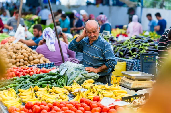 ISTANBUL, Turkey - November 2, 2015: Turkish vegetable grocery bazaar. The Grand Bazaar is one of the largest and oldest covered markets in the world.