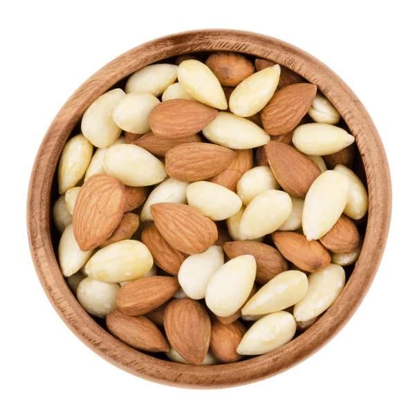 Blanched and shelled almonds in a bowl on white background — Stock Photo, Image