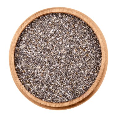 Beyaz zemin üzerinde bir kasede Chia tohum