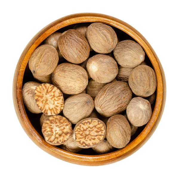 Whole Halved Nutmegs Wooden Bowl Fragrant True Nutmegs Dried Seeds — Stock Photo, Image