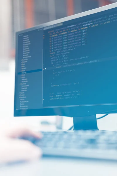 Developer working on source codes on computer at office — Stock Photo, Image