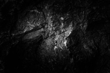 Yakın plan, aşınmış taş kaplama yüzey arka planı. Kaya dokusu detayı. Jeoloji ve Dağcılık. Tasarımcılar için soyut grunge arkaplanı