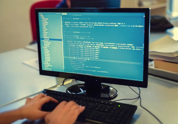 Developer working on source codes on computer at office. — Stock Photo, Image