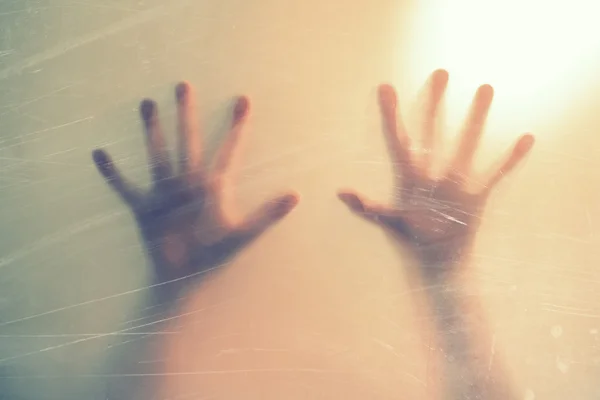 Hands behind frosted glass. depression, fear, panic, scream concept. — Stock Photo, Image