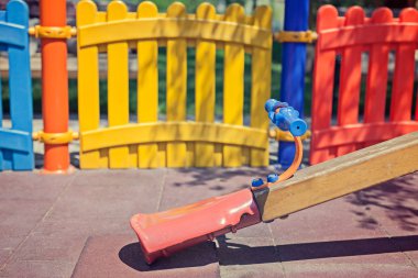 seesaw in children playground clipart