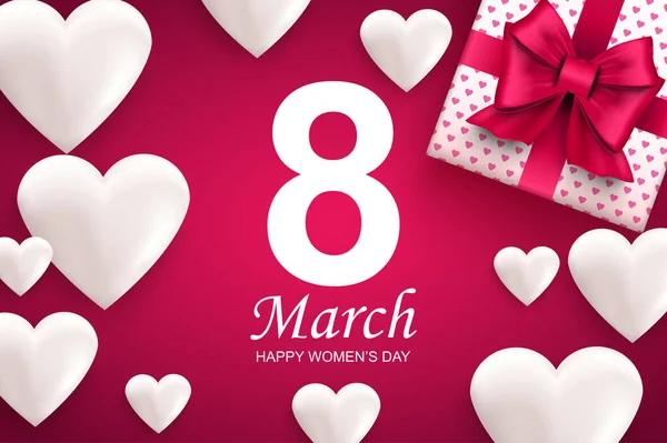 Buon biglietto di auguri per il giorno delle donne. Cuori bianchi e confezione regalo con fiocco a nastro rosa. Illustrazione vettoriale di congratulazioni l '8 marzo. Banner design con realistici elementi 3d su sfondo rosa. — Vettoriale Stock