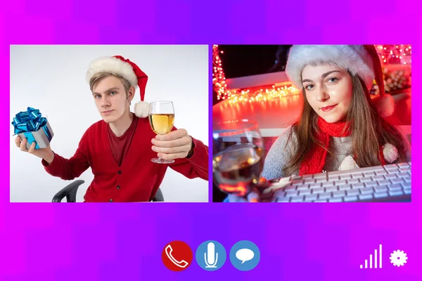 Christmas video chat. New Year video call. Guy and a girl meet Christmas by videoconference. Man and a woman make a video call on Christmas night. New Year greetings to loved ones via Internet.
