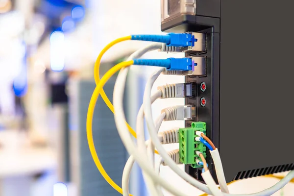 Network equipment close-up. Fiber optic networking equipment. Internet equipment. Internet transmission over fiber optic cables. Concept - setting up a local network and the Internet.