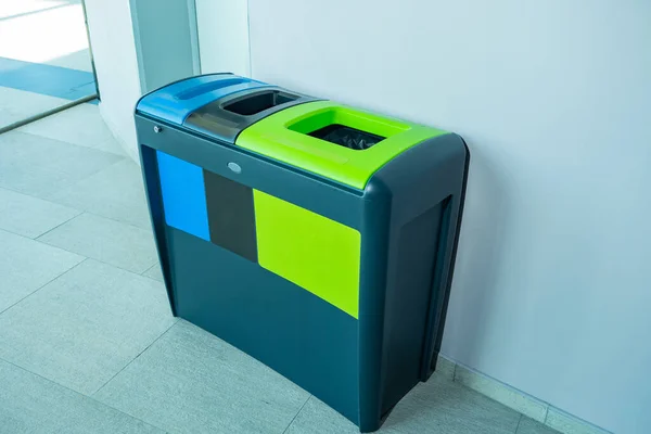 Waste bin for separate collection of flour. Indoor multi-colored trash can. Separate indoor waste tank. Garbage sorting concept. Waste sorting. Sort rubbish before discarding. Garbage cans sale