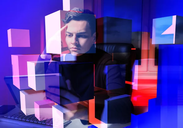 Background on topic of working as a geek. Man next to computer. Concept - computer money guy. Volumetric cubes in foreground. Computer background. Software engineer during work. Programmer career