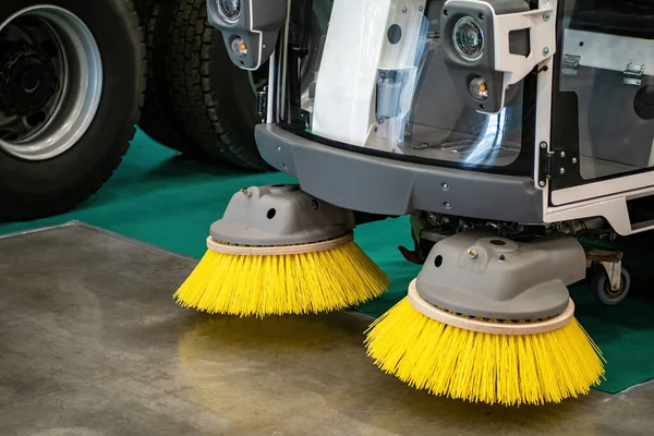 Sweeping cleaner machine. Sweeper brushes close-up. Street cleaning machine. Special technique for shaping the streets. Concept - sale of a sweeping cleaner machine. Equipment for cleaning streets