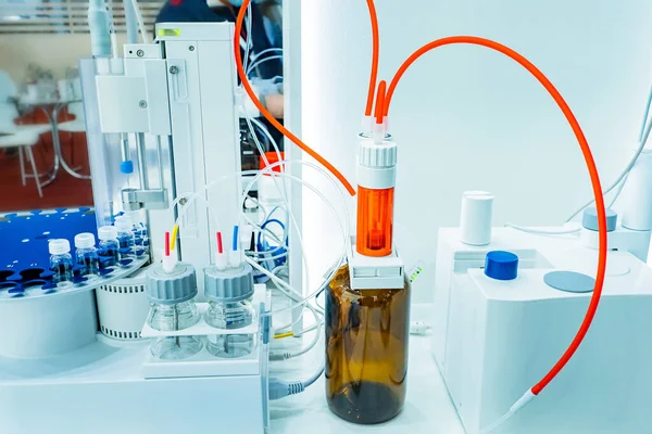 Pharmaceutical industry. Laboratory of a pharmaceutical company. Equipment for the development of new drugs. Laboratory equipment for distillation. A laboratory device with plastic tubes.