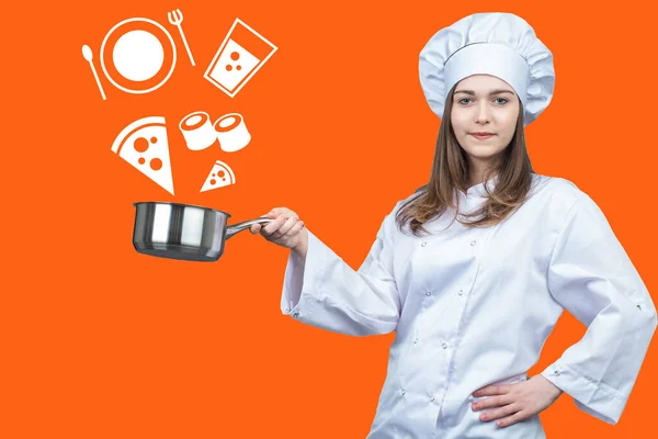 Woman restaurant chef. Restaurant chef on red background. Woman in  uniform of restaurant chef. Girl cook looks at camera. Cook poses with a camtrule in his hands. Cafe employee career.