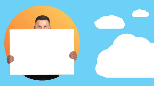 Creative portrait of man with banner. Blank banner in hands of guy. Young man covers his face with banner. He is on background of illustrations with sky. Place to showcase text or images