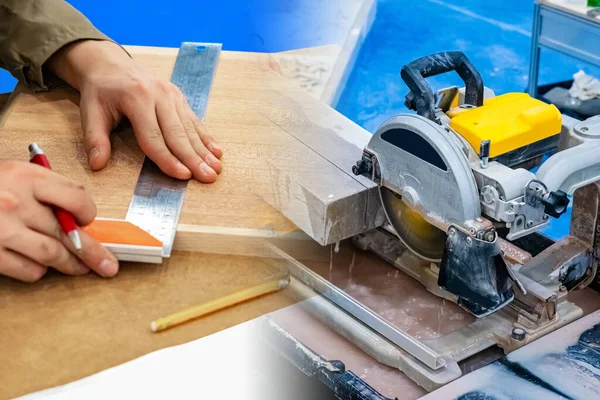 Carpenter works with wood. Carpenter hands next to circular saw. Carpenter determines size with ruler. Working with wood stationary circular saw. Circular saw during work. Furniture manufacturing