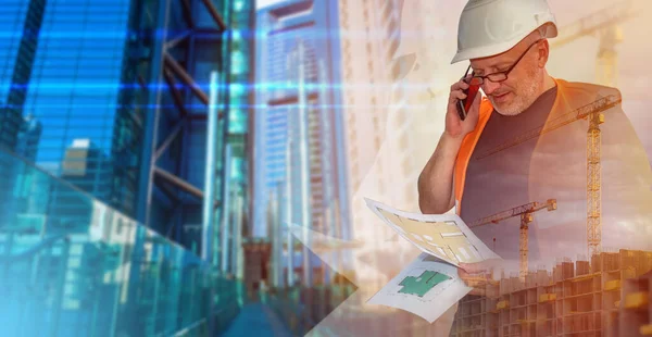 An architect in a working uniform. Architect in the uniform of a builder. Double exposure portrait of an architect. The builder holds architectural blueprints. Blurred buildings behind him.