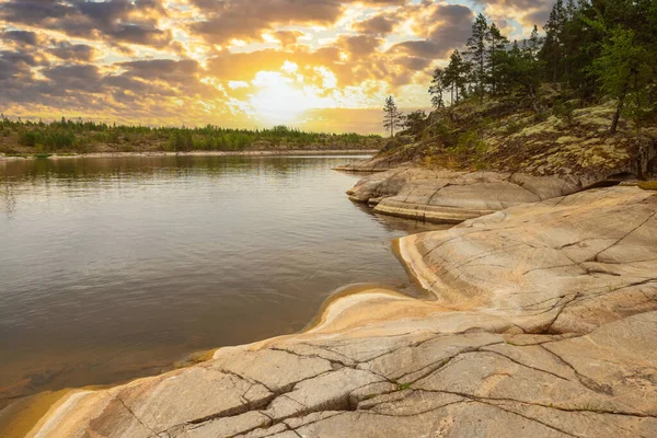 Rocks of Karelia. Landscapes of Russia. Ladoga lake. Skers of Ladoga Lake. Karelia on summer day. Excursion to Republic of Karelia. Russian northern nature. Sunset over region of Russia.