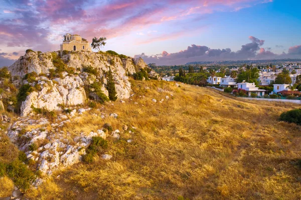 Cyprus view from a quadcopter. Landscape of city of Protaras. Church of Prophet Elijah on a stone hill. Excursions to Prophet Elijah. Protaras drone view. Holidays in Republic of Cyprus.