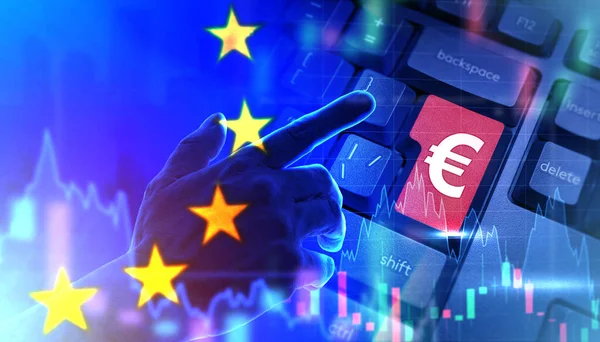 European Union financial market concept. Investments in European market. Stock charts next to EU flag. Euro logo on keyboard. Investments in European stock market. EU stock exchanges.