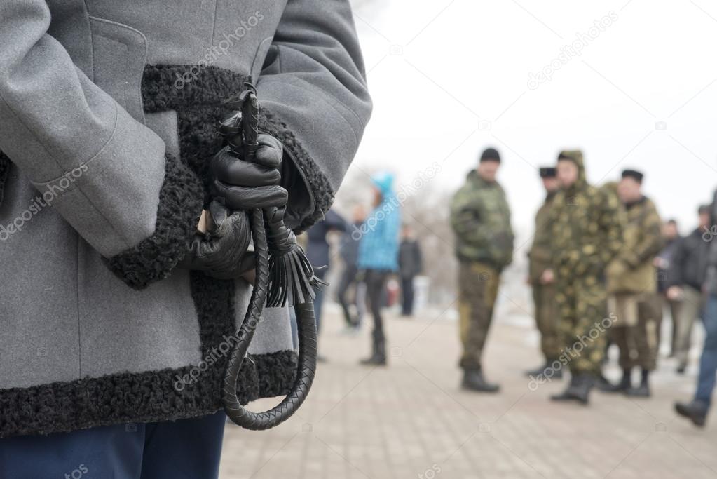 Cossack whip at the mourning rally dedicated to Boris Nemtsov murder, Voronezh, Russia.