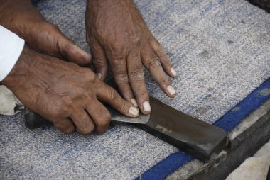 Manuel netlik shoemaker'ın aracı, Hindistan.