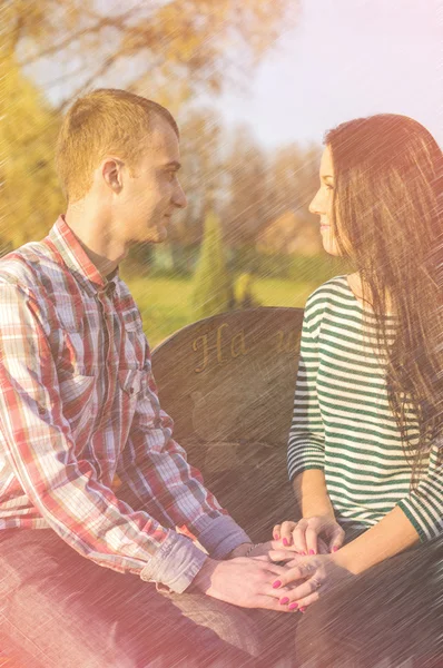 Young couple outdoors in autumn park young. — Stock Photo, Image