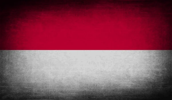 Bandera de Indonesia con textura antigua. Vector — Vector de stock