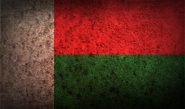 Drapeau de Madagascar avec une texture ancienne . — Image vectorielle