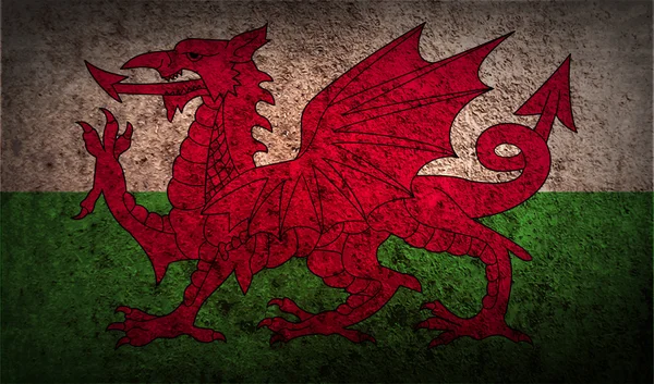 Flagge von Wales mit alter Textur — Stockvektor