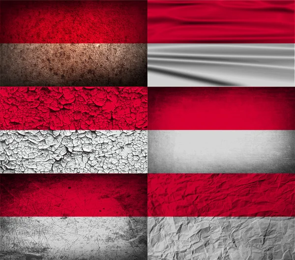 Flag of Monaco with old texture. Vector — Stock Vector