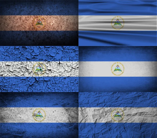 Flagga Nicaragua med gamla konsistens. Vektor — Stock vektor