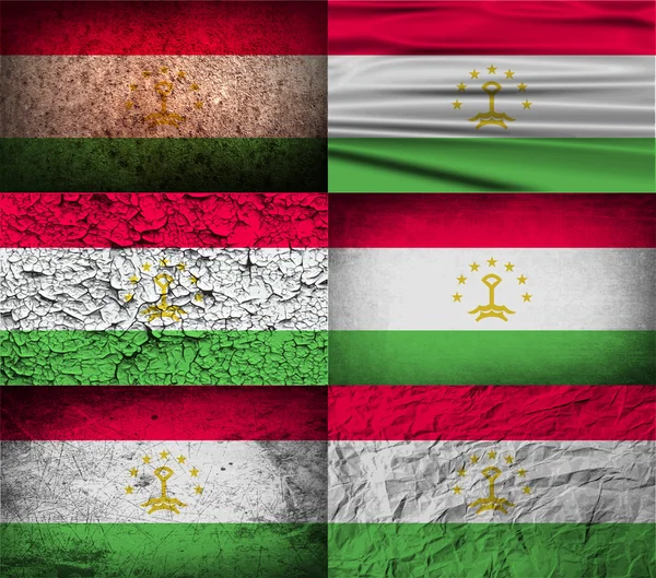 Flag of Tajikistan with old texture. Vector — Stock Vector