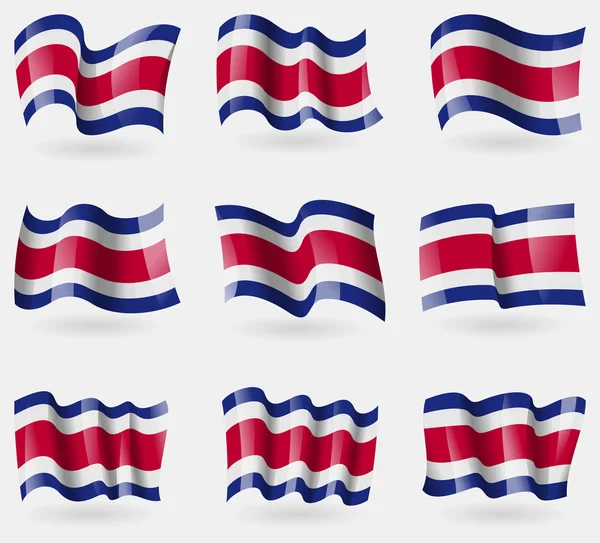 Set of Costa Rica flags in the air. Vector — Stock Vector