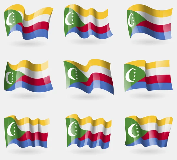 Set of Comoros flags in the air. Vector — Stock Vector