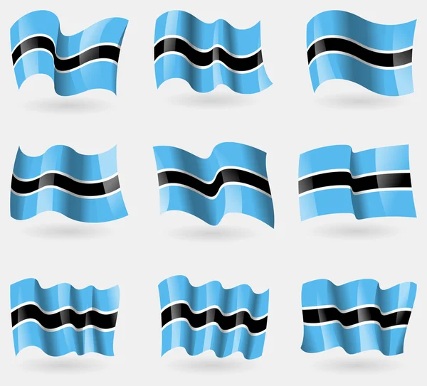 Set of Botswana flags in the air. Vector — Stock Vector