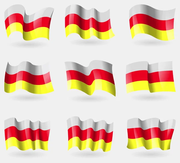 Set of North Ossetia flags in the air. Vector — Stock Vector