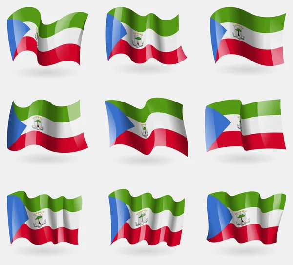 Set of Equatorial Guinea flags in the air. Vector — Stock Vector