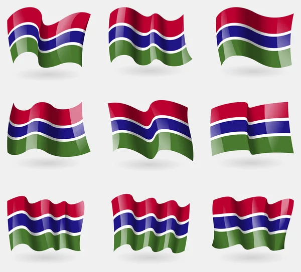 Set of Gambia flags in the air. Vector — Stock Vector