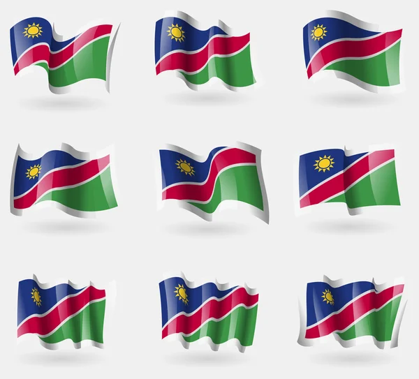 Set of Namibia flags in the air. Vector — Stock Vector
