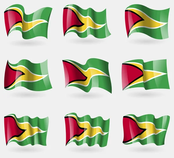 Juego de banderas de Guyana en el aire. Vector Vectores de stock libres de derechos