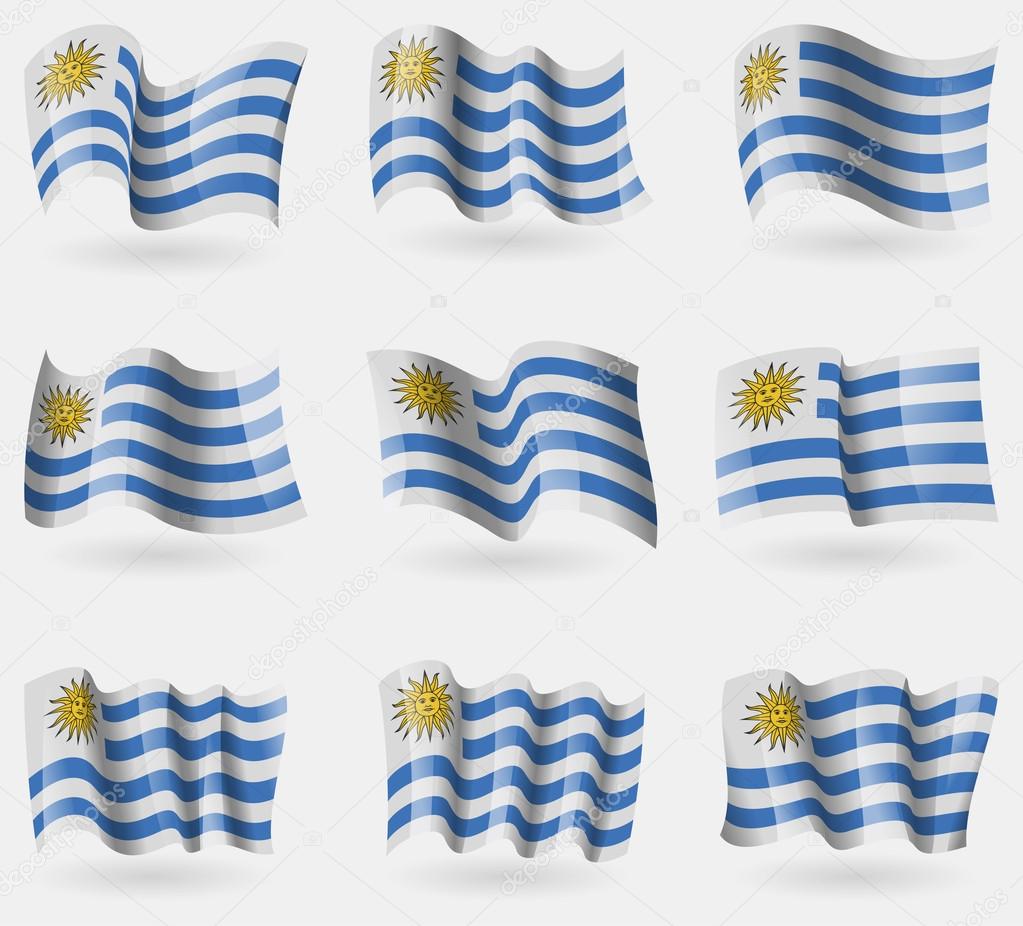 Set of Uruguay flags in the air. Vector