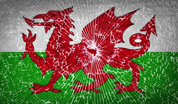 Флаги Уэльса с разбитой стеклянной текстурой. Вектор — стоковый вектор
