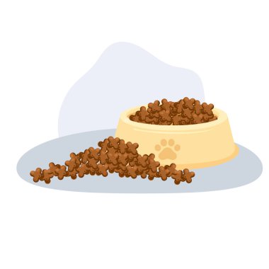 Dökülmüş mamaları olan bir yemek kasesi.