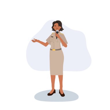 Resmi sunum sırasında mikrofona konuşan kadın hükümet memuru.