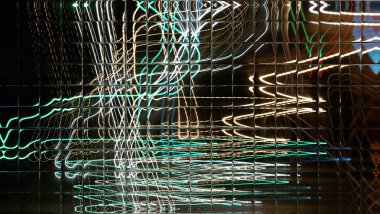 Işık efektleri. Neon parıltısı. Çok renkli soyut arkaplan. Renkli desen. Poster, broşür, el ilanı ve kart için yaratıcı grafik tasarımı. Eşsiz duvar kâğıdı. Ağ, kumaş ve not defteri kapağı için arkaplan.